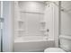 Bathroom with shower/tub combo and built-in shelving at 5312 Verona Rd # 74, Charlotte, NC 28213