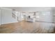 Modern kitchen with white cabinets and a large island at 5312 Verona Rd # 74, Charlotte, NC 28213