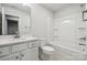 Clean bathroom with white vanity, bathtub, and shower at 8352 Acadia Pkwy # 15, Sherrills Ford, NC 28673