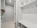 Laundry area with built-in bench and storage at 8352 Acadia Pkwy # 15, Sherrills Ford, NC 28673