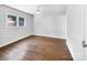 Simple bedroom with hardwood floors and ceiling fan at 1819 Danbury St, Gastonia, NC 28052