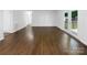 Spacious living area with hardwood floors and access to backyard at 1819 Danbury St, Gastonia, NC 28052