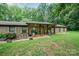 Brick ranch home with covered entryway and landscaping at 1901 Davenport St, Newton, NC 28658