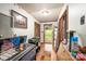 Home entryway with wood flooring and access to backyard at 1901 Davenport St, Newton, NC 28658