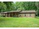 Ranch-style home with brick facade and covered porch at 1901 Davenport St, Newton, NC 28658