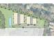 Plot plan showing the layout of townhouses, parking, and green spaces within the community development at 1008 Ribbon Ln, Charlotte, NC 28205