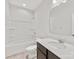 Bathroom with bathtub, toilet and single vanity at 1008 Ribbon Ln, Charlotte, NC 28205