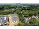 Aerial view of townhouses and surrounding area, showcasing the community's setting and proximity to city skyline at 1008 Ribbon Ln, Charlotte, NC 28205