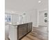 Kitchen island with granite countertop and gray cabinets at 1008 Ribbon Ln, Charlotte, NC 28205