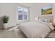 Bedroom with queen-size bed and large window at 1008 Ribbon Ln, Charlotte, NC 28205