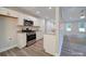 Modern kitchen with stainless steel appliances and granite countertops at 526 Manchester Rd, Mount Gilead, NC 27306
