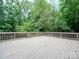 Deck offering scenic wooded views at 526 Manchester Rd, Mount Gilead, NC 27306