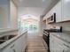 Updated kitchen with stainless steel appliances and granite counters at 526 Manchester Rd, Mount Gilead, NC 27306