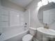 Updated bathroom with a tub, shower, toilet and vanity at 526 Manchester Rd, Mount Gilead, NC 27306