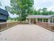 Spacious deck overlooking a wooded backyard at 526 Manchester Rd, Mount Gilead, NC 27306