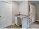 Basement wet bar with granite countertop and white cabinets at 526 Manchester Rd, Mount Gilead, NC 27306
