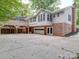 Single story home with attached garage, deck, and ample parking at 526 Manchester Rd, Mount Gilead, NC 27306