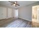 Bedroom with hardwood floors, ceiling fan and bathroom access at 526 Manchester Rd, Mount Gilead, NC 27306