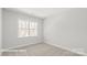 Bright bedroom with large window at 10607 Audubon Ridge Dr # 27, Cornelius, NC 28031