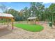 Community dog park with turf and shaded areas at 10607 Audubon Ridge Dr # 27, Cornelius, NC 28031