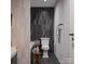 Modern bathroom with dark tile, white toilet and bathtub at 1137 6Th St, Lancaster, SC 29720