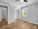 Bedroom with wood flooring, closet, and ceiling fan at 806 Lee St, Kings Mountain, NC 28086