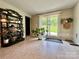 Laundry room with sliding glass door leading to the backyard at 469 Radio Rd, Taylorsville, NC 28681