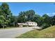 Split level brick home with a large yard at 469 Radio Rd, Taylorsville, NC 28681