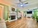 Living room with fireplace and hardwood floors at 469 Radio Rd, Taylorsville, NC 28681