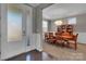 Bright dining room with hardwood floors and a view into the foyer at 128 Stibbs Cross Rd, Mooresville, NC 28115