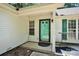 Inviting front door entrance with teal door at 6236 Old Corral St, Charlotte, NC 28277