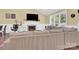 Spacious living area with a cozy fireplace and large windows at 6236 Old Corral St, Charlotte, NC 28277