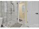 Bathroom with a shower, toilet and access to another room at 6236 Old Corral St, Charlotte, NC 28277