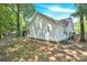 Side view of house showcasing screened porch at 6236 Old Corral St, Charlotte, NC 28277