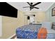 Comfortable bedroom with a ceiling fan and flat-screen TV at 6236 Old Corral St, Charlotte, NC 28277