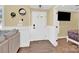 Bright entryway with hardwood floors and view into living room and bedroom at 6236 Old Corral St, Charlotte, NC 28277