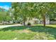 Charming house with green lawn, basketball hoop, and driveway at 6236 Old Corral St, Charlotte, NC 28277