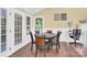 Dining area with a round table, four chairs and home office space at 6236 Old Corral St, Charlotte, NC 28277