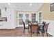 Bright dining area with a round table and access to the backyard at 6236 Old Corral St, Charlotte, NC 28277