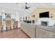 Open concept living room with vaulted ceilings and sectional sofa at 6236 Old Corral St, Charlotte, NC 28277