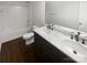 Main bathroom with double vanity and bathtub at 3935 Sky Dr, Charlotte, NC 28226