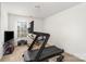 Home gym with treadmill and other exercise equipment at 642 Nannyberry Ln, Concord, NC 28025