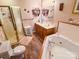 Bathroom with a large garden tub and double vanity at 1470 River Hills Ct, Taylorsville, NC 28681