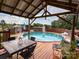 Relaxing pool area with gazebo and outdoor dining at 1470 River Hills Ct, Taylorsville, NC 28681