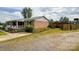 Brick ranch home with covered porch and landscaped yard at 1470 River Hills Ct, Taylorsville, NC 28681