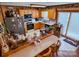 Kitchen with oak cabinets and a breakfast bar at 1470 River Hills Ct, Taylorsville, NC 28681