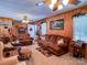 Spacious living room with wood walls and ample seating at 1470 River Hills Ct, Taylorsville, NC 28681