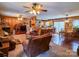 Open living space with a kitchen, dining area, and fireplace at 1470 River Hills Ct, Taylorsville, NC 28681