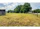 Open pasture with rustic outbuilding at 1470 River Hills Ct, Taylorsville, NC 28681