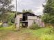 Rustic barn with metal siding, showing potential for renovation at 1470 River Hills Ct, Taylorsville, NC 28681